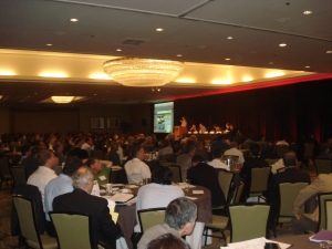 A sold out ballroom full of investors, presenters, and friends.